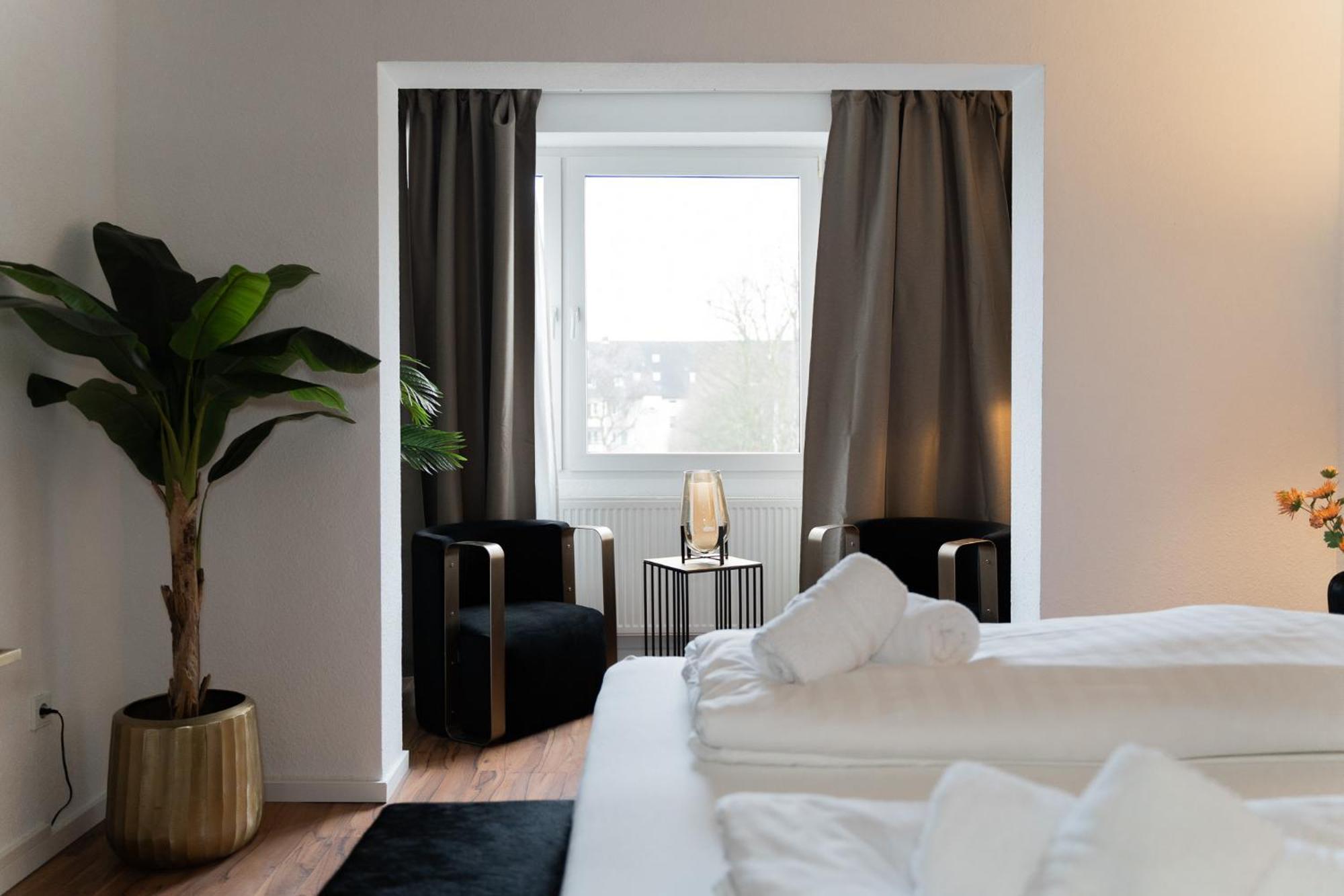 Junik Apartments "Am Sternbuschweg" Duisburg Quarto foto